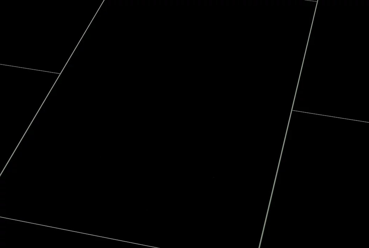 Kings Canyon Laminat Stonegloss Schwarz Fliese 4V zum Klicken Raum1