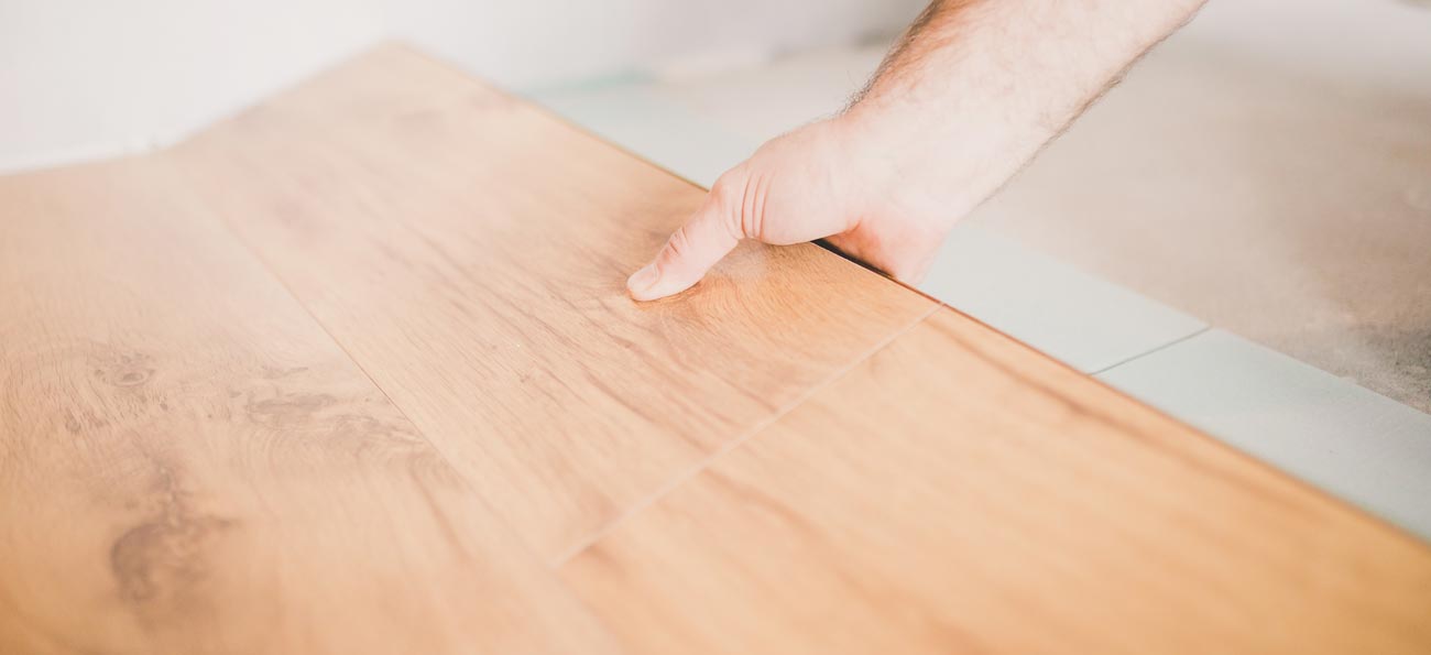 Laying laminate flooring on tiles